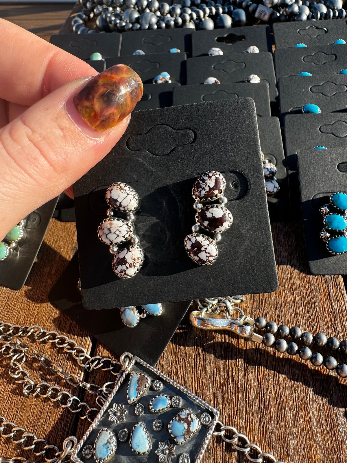 Wild horse 3 stone stud earrings