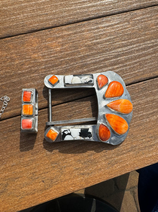 Orange spiny and white buffalo belt buckle