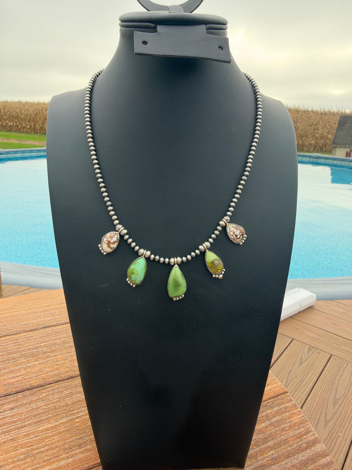 Sonoran gold turquoise and wild horse on pearls