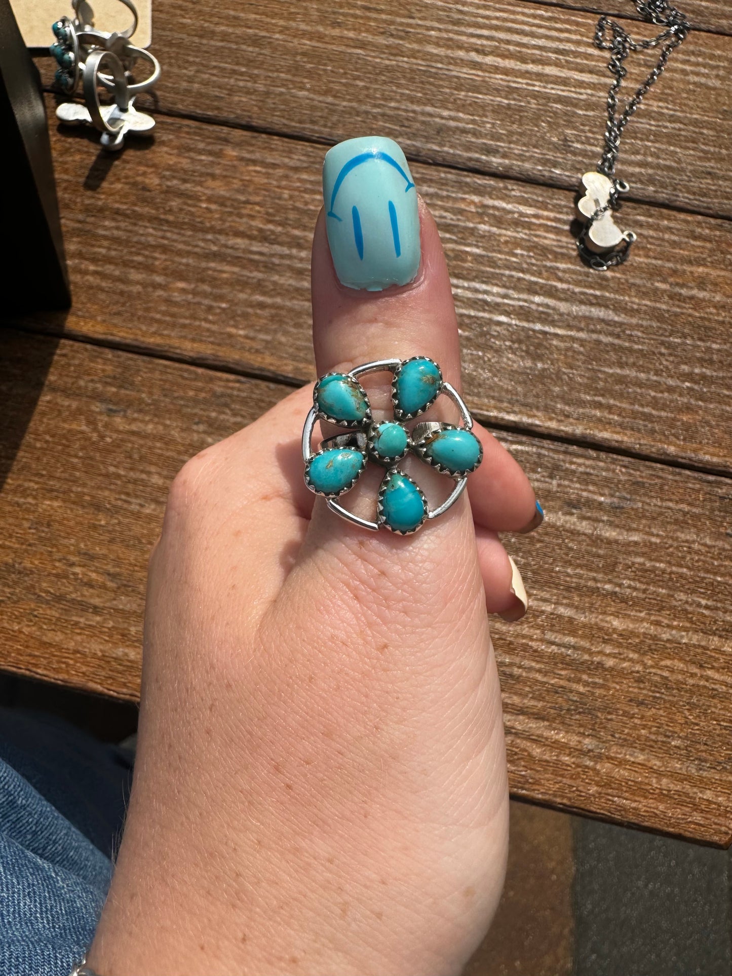 Adjustable turquoise flower ring with round edges