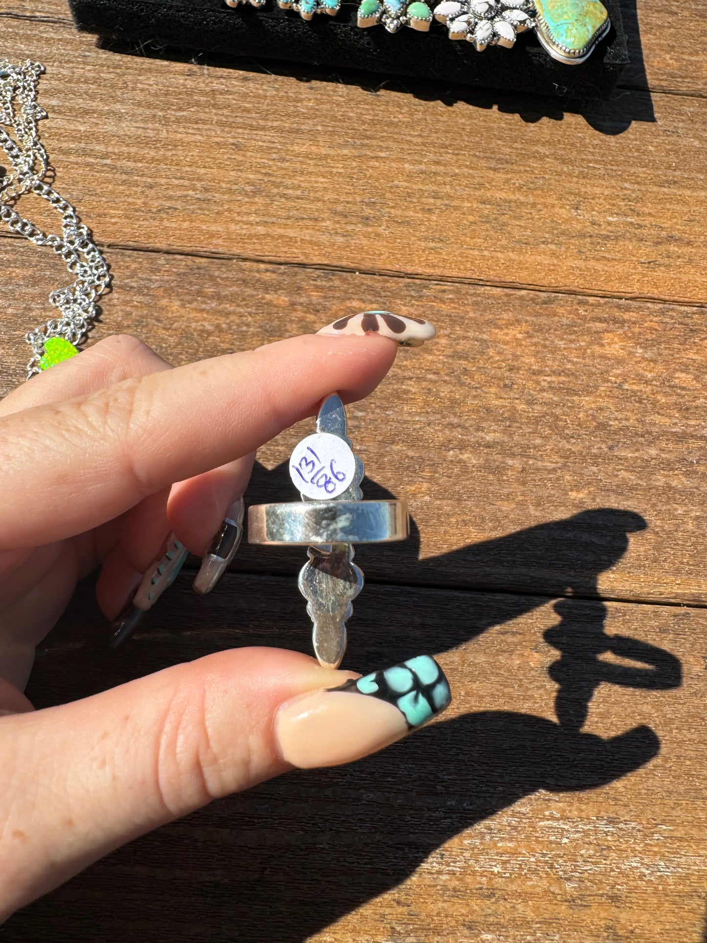 Black stallion dahlia 5 stone crawler ring