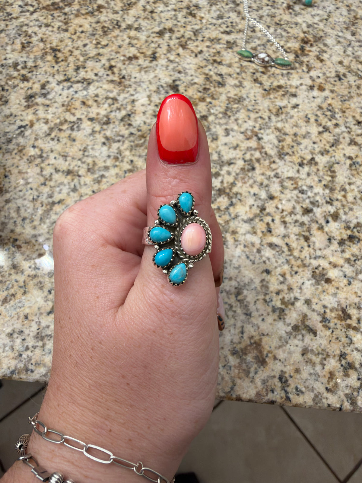 Pink conch and Kingman turquoise half cluster adjustable ring