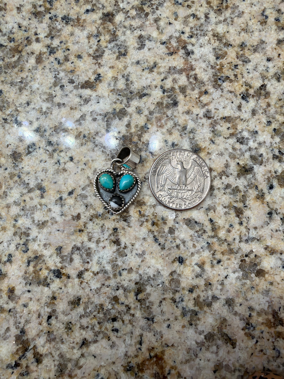 Turquoise and white buffalo heart pendant