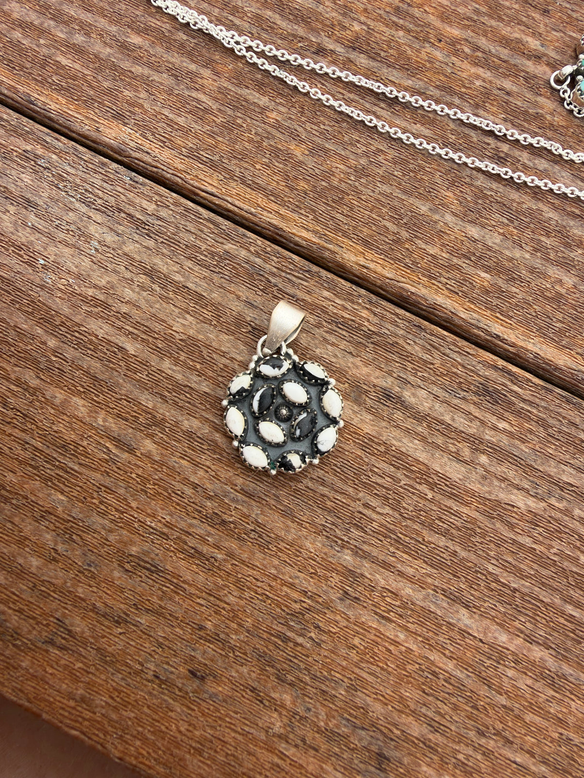 White buffalo cluster pendant