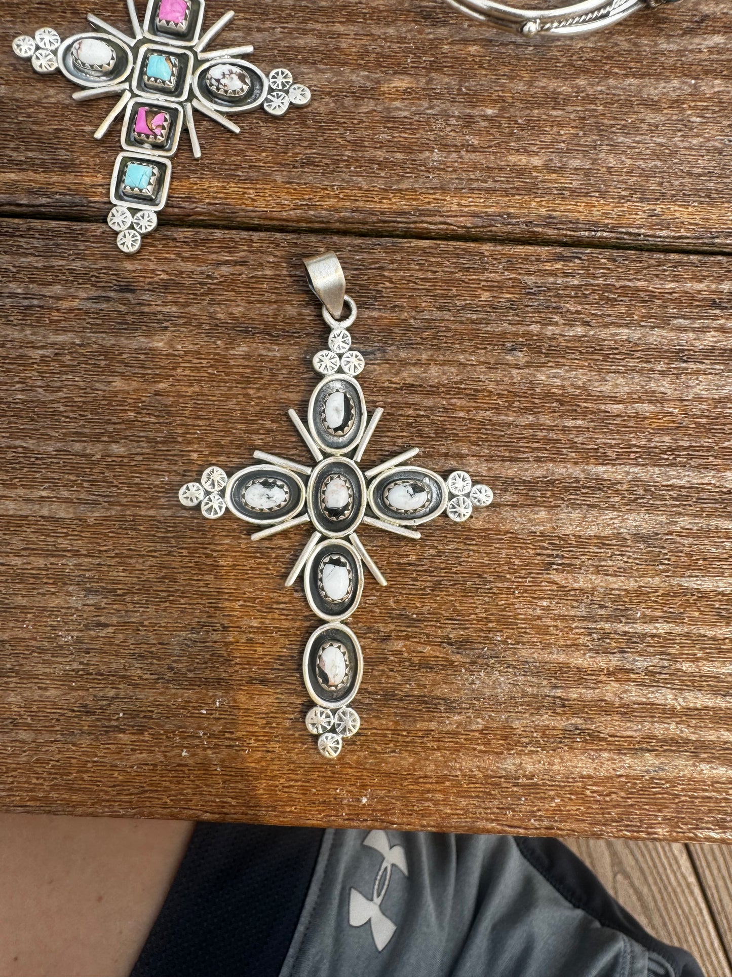 White Buffalo cross pendant