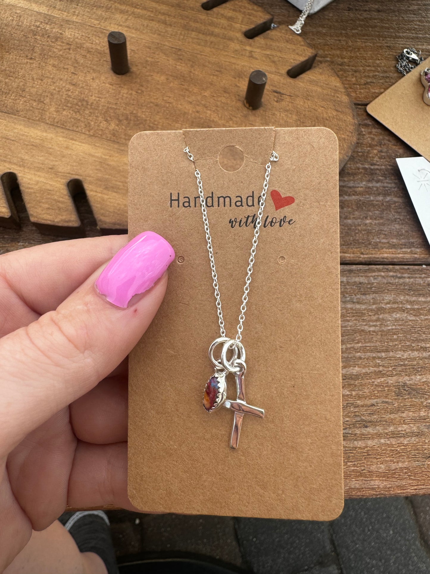 Pink dahlia cross necklace
