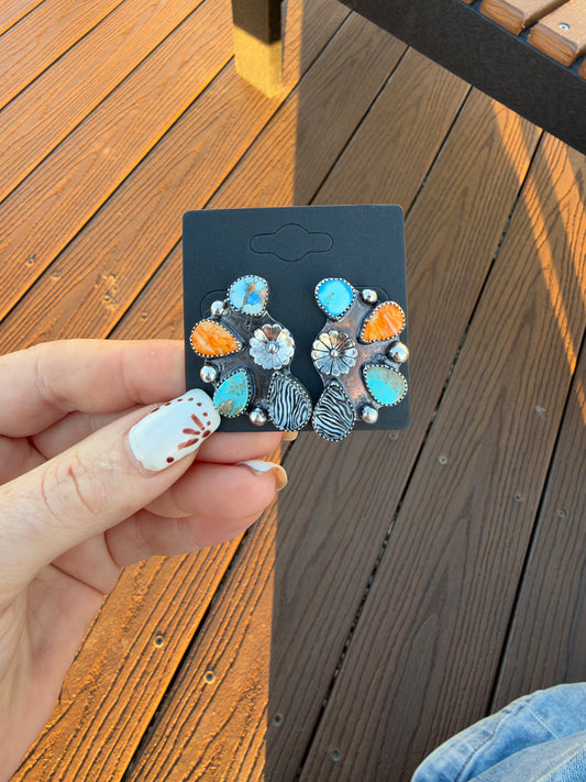 Multistone half cluster earrings