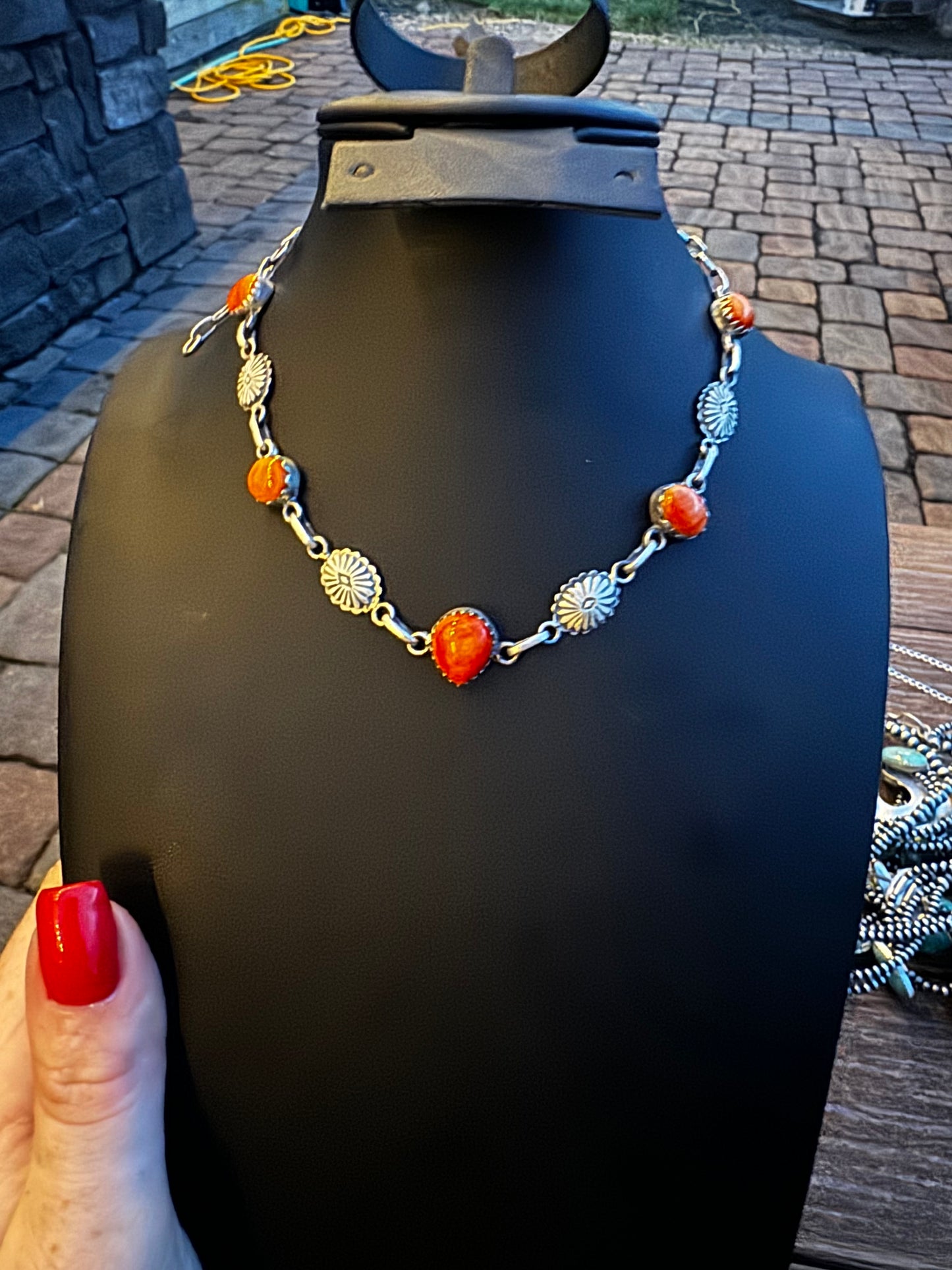 Orange spiny and concho choker style necklace
