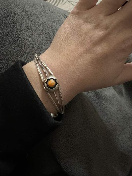 Native orange spiny shadowbox cuff made by Esther white