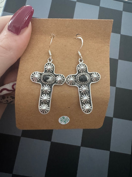 White Buffalo cross dangles with conches