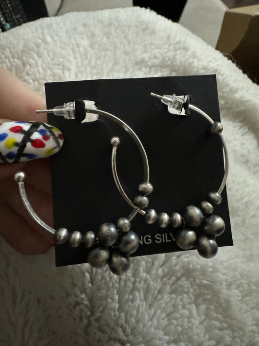 Pearl hoop earrings with cluster