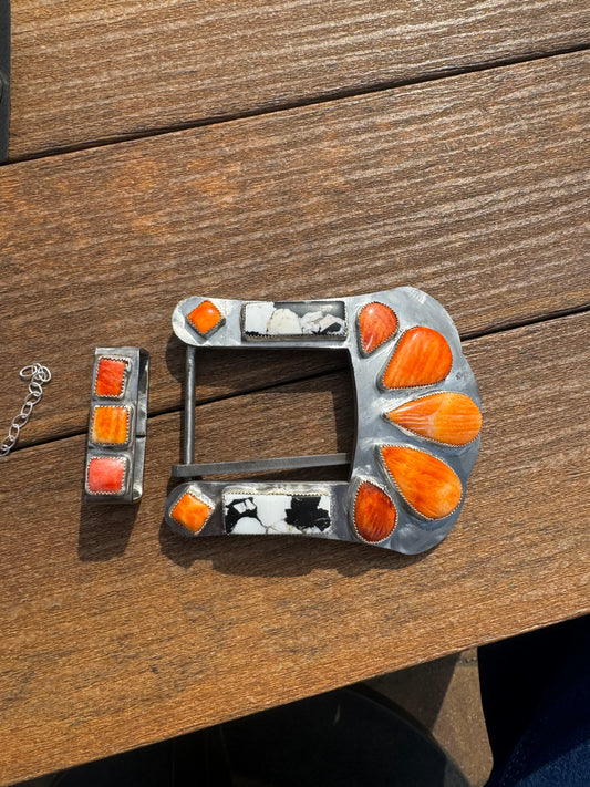 Orange spiny and white buffalo belt buckle