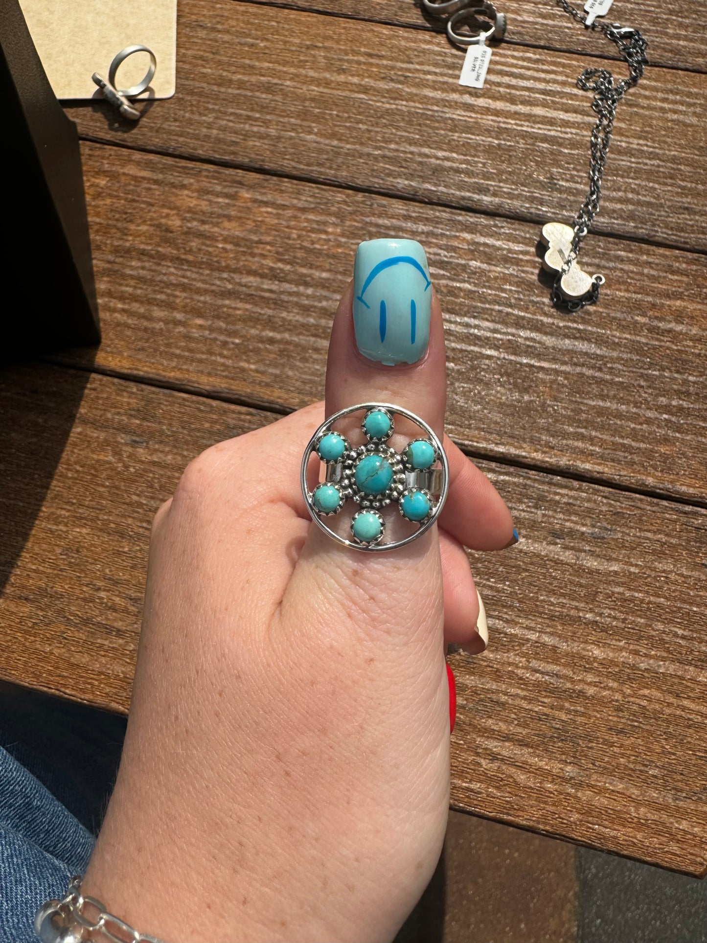 Adjustable turquoise flower ring with round edge