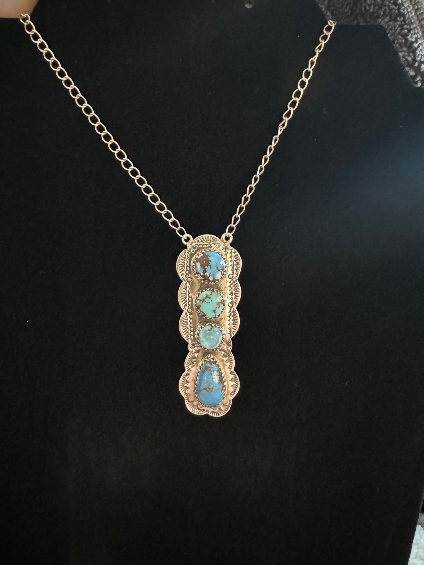 Golden hills turquoise 4 stone vertical drop necklace with silver work
