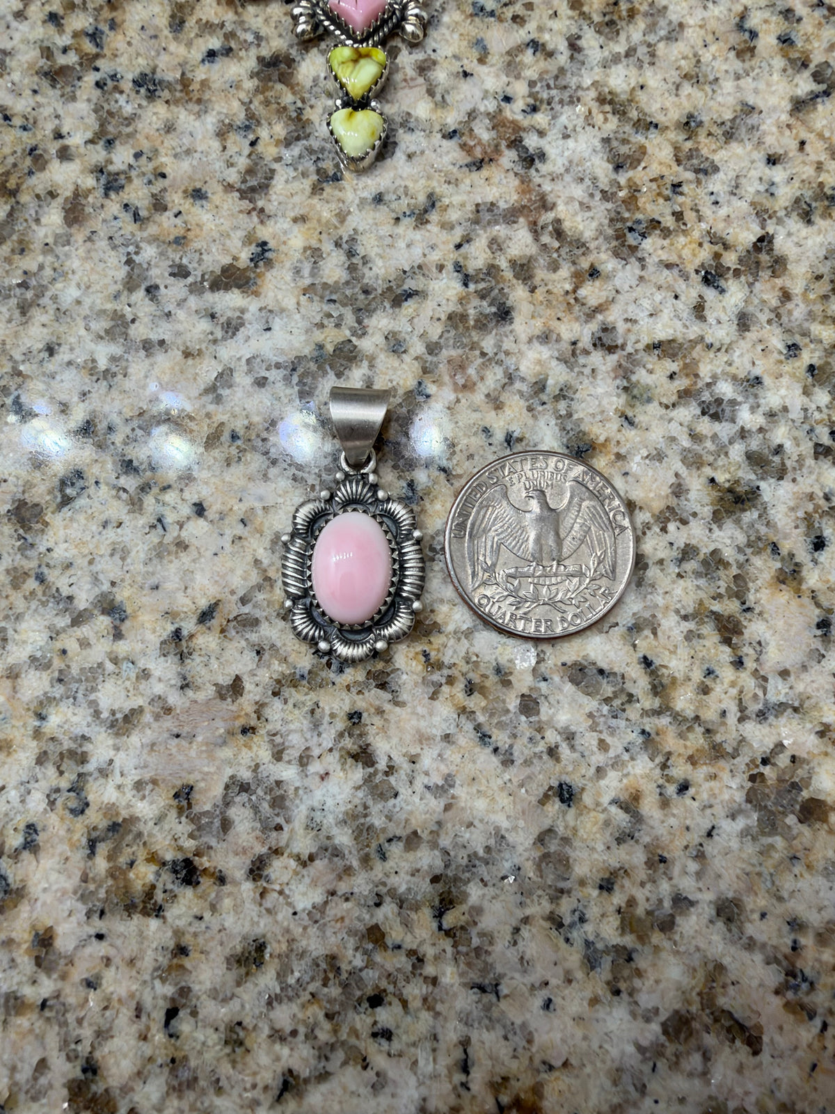 Pink conch pendant